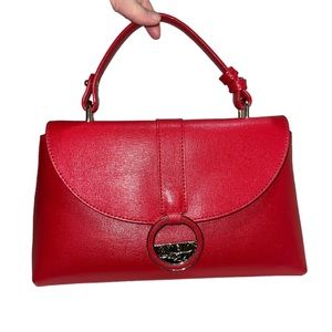 Authentic Versace hand bag. Used once, perfect in & out